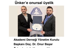 Onur Özbozkurt’tan Ümit Ünker’e Onursal Üyelik